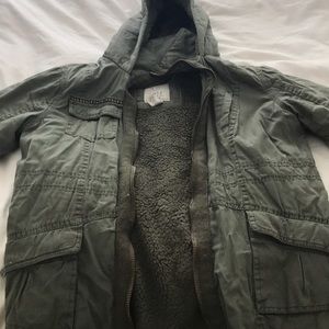 A camo green fuzzy jacket.